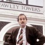Basil Fawlty outside his hotel